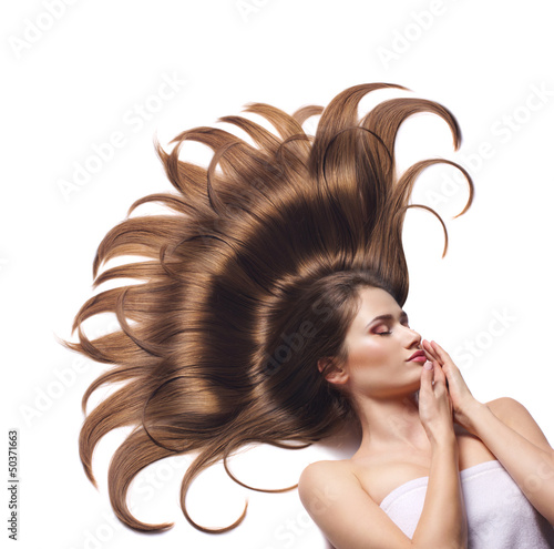 Photo: young woman with beautiful brown hair young woman with beautiful brown hair