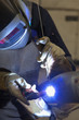 welder in factory welding inox