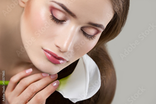 Photo: close-up portrait of a beatiful young woman close-up portrait of a beatiful young woman