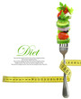 Fresh mixed vegetables on fork with measuring tape
