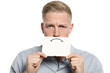 Upset businessman presenting blank white card.