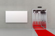 Elevator with red carpet and blank billboard