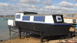 A houseboat in portsmouth harbour in england