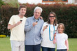 Photo: Happy Family Enjoying Outdoors Happy Family Enjoying Outdoors