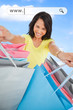 Woman showing her shopping bags under address bar