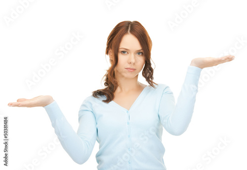 Photo: measuring something on the palms of her hands measuring something on the palms of her hands