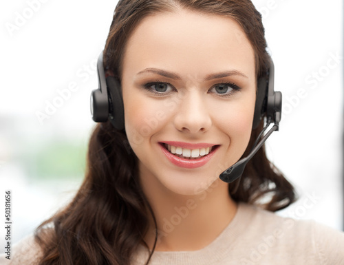 Photo: friendly female helpline operator friendly female helpline operator