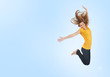 Photo: Pretty young woman jumping for joy Pretty young woman jumping for joy