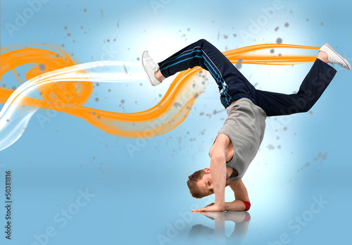 Photo: Break dancer busting out a move Break dancer busting out a move