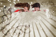Girls looking down on copy space on art deco style background