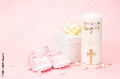 Photo: Christening candle with pink baby booties and gift box Christening candle with pink baby booties and gift box