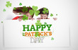 Girls holding placard with st patricks day greeting