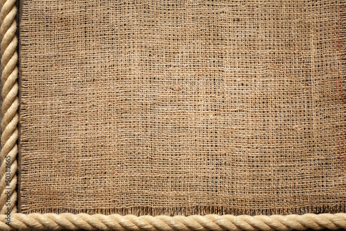 Photo: Rope and jute old vintage background concept on boards Rope and jute old vintage background concept on boards