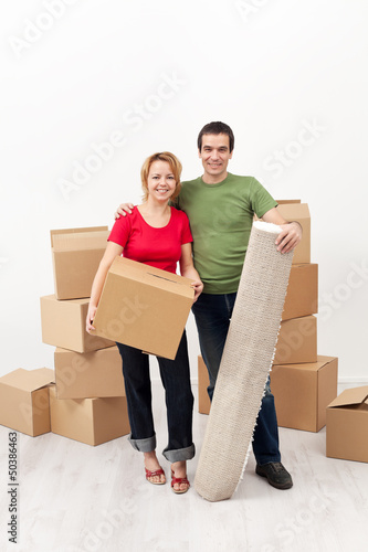 Photo: Happy couple moving together Happy couple moving together