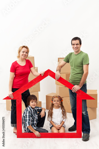 Photo: Family with kids buying a new home Family with kids buying a new home