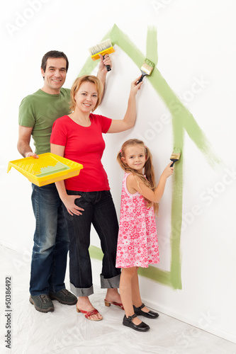 Photo: Family in their new home Family in their new home