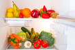 Fridge full of healthy fruits and vegetables