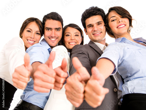 Photo: Business team with thumbs up Business team with thumbs up