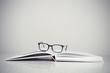 Glasses on book