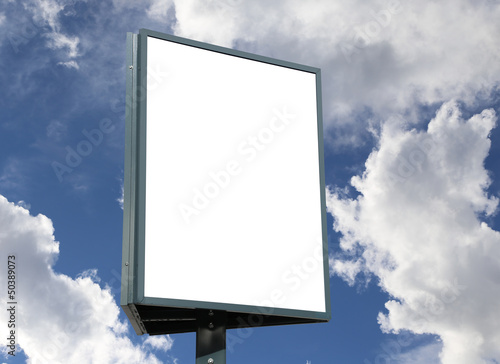 Photo: Large blank, empty, white billboard screen, on cloudy sky Large blank, empty, white billboard screen, on cloudy sky