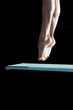 close up of feet on the trampoline blue
