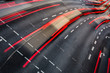 Motion blurred city road traffic (color toned  image)