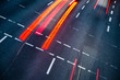 Motion blurred city road traffic (color toned  image)