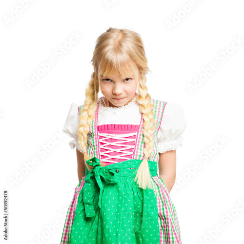 Photo: bockiges kleines Mädchen im Dirndl bockiges kleines Mädchen im Dirndl