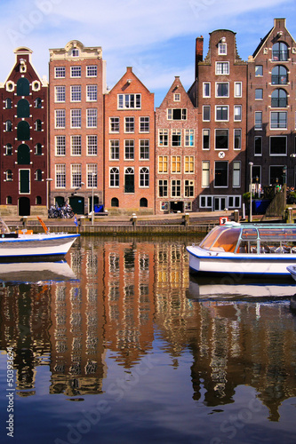 Photo: Canal houses of Amsterdam, Netherlands with reflections Canal houses of Amsterdam, Netherlands with reflections