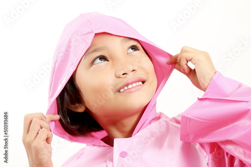 Photo: Girl In Pink Raincoat Girl In Pink Raincoat