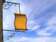 Signboard in retro style on a background of sky