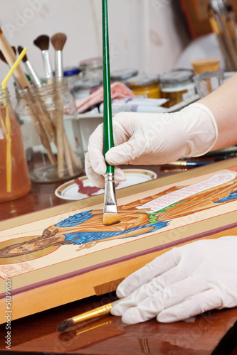 Photo: painter makes new Christian icon with Christ painter makes new Christian icon with Christ