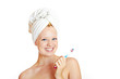 portrait of a beautiful blonde with white towel on her head