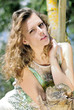 beautiful girl in green wood by summer