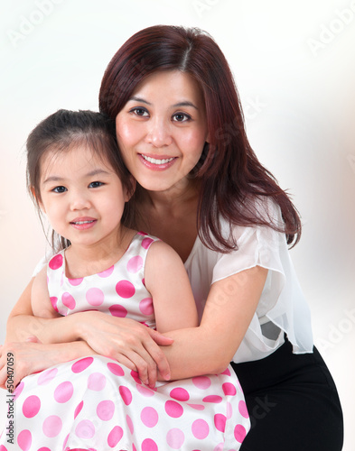 Photo: Mother hugging her daughter Mother hugging her daughter