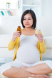 Pregnant Woman Taking Suppleme...