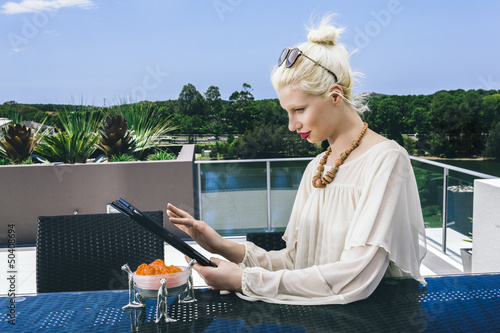 Photo: Woman surfing the net Woman surfing the net