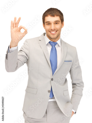 Photo: handsome man showing ok sign handsome man showing ok sign