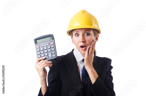 Photo: Female construction worker with calculator Female construction worker with calculator