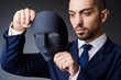 Man with black mask in studio