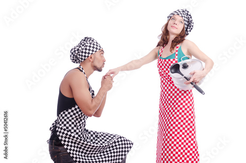 Photo: Pair of funny cooks on white Pair of funny cooks on white