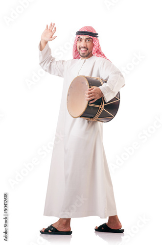 Photo: Arab man playing drum isolated on white Arab man playing drum isolated on white