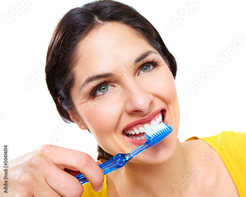 Photo: Beautiful woman with a toothbrush. Beautiful woman with a toothbrush.