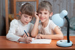 children drawing on paper