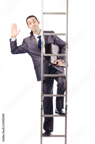 Photo: Businessman climbing the ladder isolated on white Businessman climbing the ladder isolated on white
