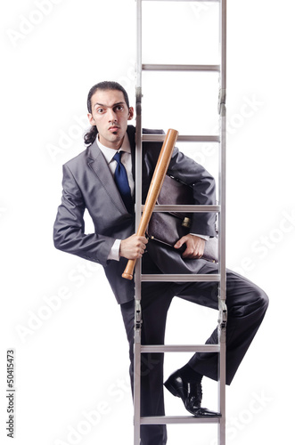 Photo: Businessman climbing the ladder isolated on white Businessman climbing the ladder isolated on white