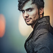 Multicolored digital painted image of elegant young man.