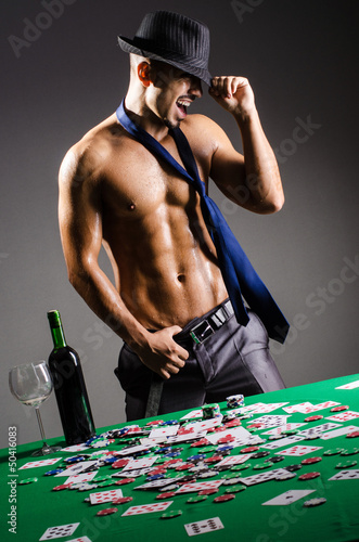 Photo: Naked broke businessman in casino Naked broke businessman in casino
