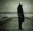 man with white mask near the river