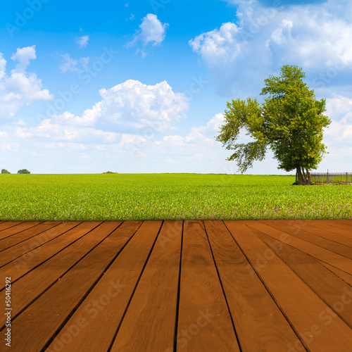 Photo: Old Table Surface With Blurred Countryside Landscape Old Table Surface With Blurred Countryside Landscape